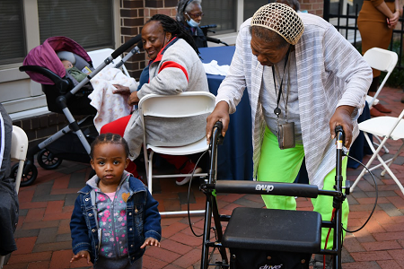 Project Waves residents at ribbon cutting ceremony