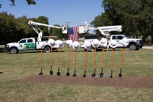 ecoLink groundbreaking celebration hats on shovels