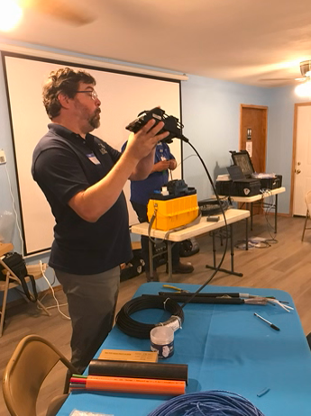 Digital Op Lab Chris holding splicer 