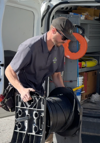 UTOPIA Fiber installer UTOPIA Fiber installer takes equipment out of back of van