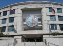 CPUC office building with state seal above doorway
